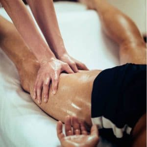 male sports person taking a sports deep tissue massage in Sevenoaks Kent