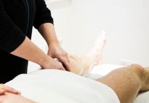 man taking a sports massage in sevenoaks kent