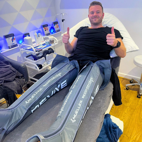 man giving a thumbs up whilst wearing compression therapy trousers in cryojuvenate in sevenoaks